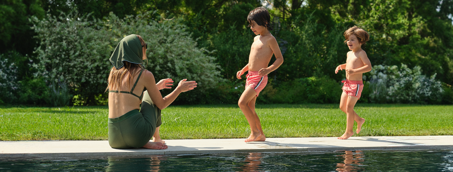 jamie mizrahi and sons wearing minnow by the pool