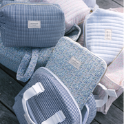 navy stripe interior coated travel pouch