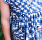 girls navy gingham pinafore dress