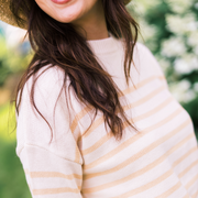 women's cream and tan stripe knit sweater