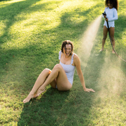 women's slate floral low back ruffle one piece