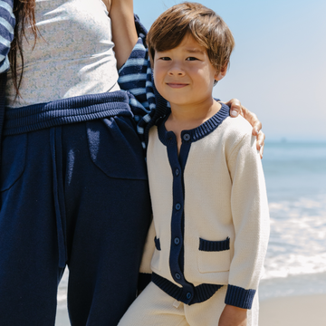 unisex cream and navy trim knit cardigan