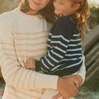 women's cream and tan stripe knit sweater