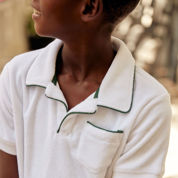 unisex white terry polo with ribbed hem