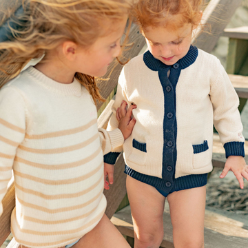 unisex cream and navy trim knit cardigan