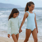 girls pacific blue stripe crossover one piece