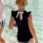 girls navy with white trim ruffle sleeve rashguard one piece