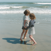 girls cream and navy stripe skirt with shorts