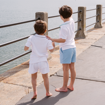 boys white french terry short with navy side piping