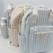 powder blue stripe coated everyday backpack