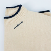women's cream cropped knit sweater with navy trim