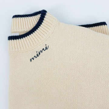 women's cream cropped knit sweater with navy trim