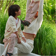 women's cream cropped knit sweater with red trim