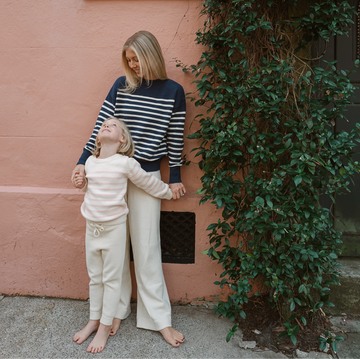 unisex cream and pink stripe knit sweater