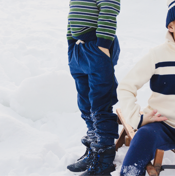 unisex navy french terry sweatpant with evergreen side piping