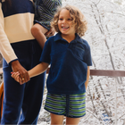 unisex navy french terry polo with evergreen trim