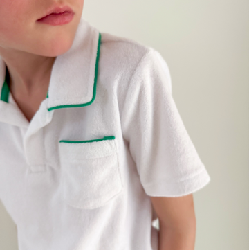 boys white french terry polo with bermuda green trim