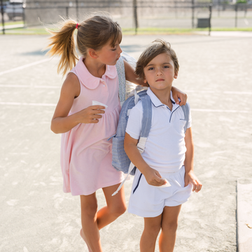 boys white french terry shorts with navy trim