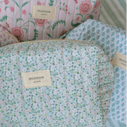 sea marsh floral interior coated travel pouch