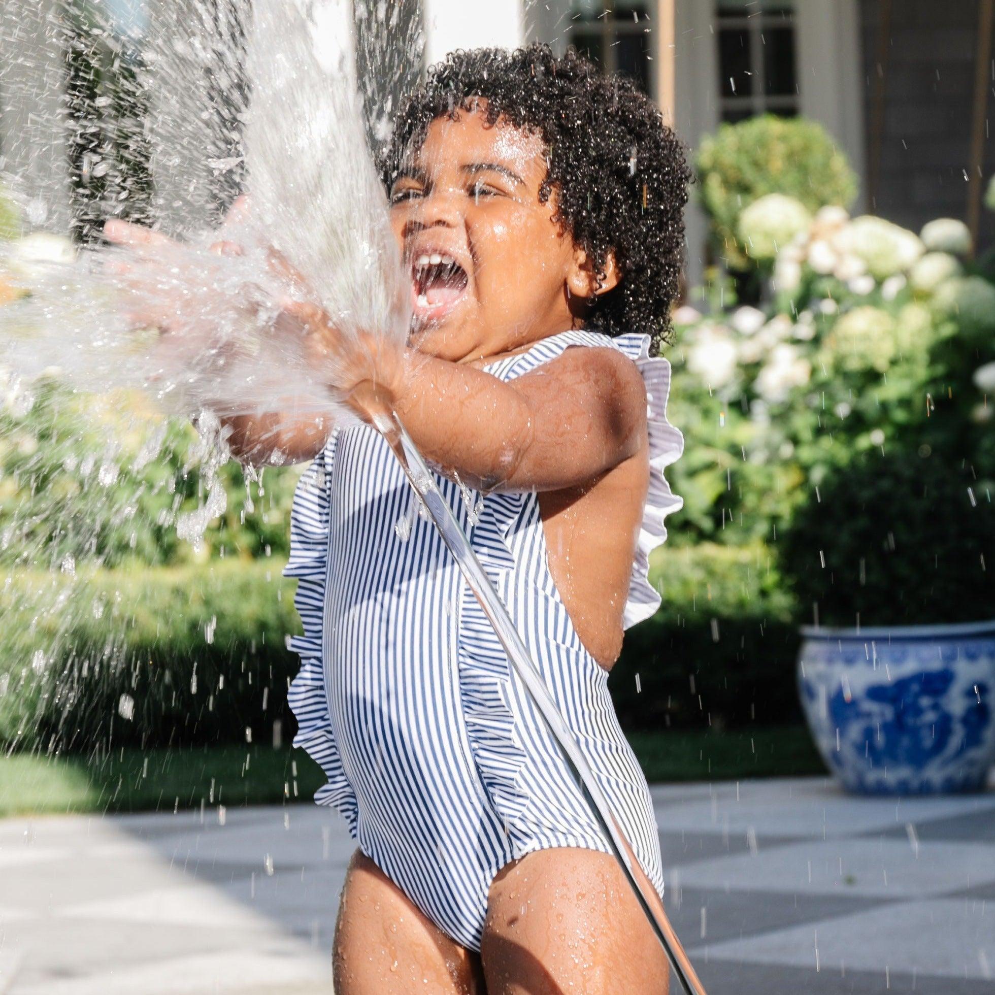 girls navy stripe ruffle one piece minnow swim